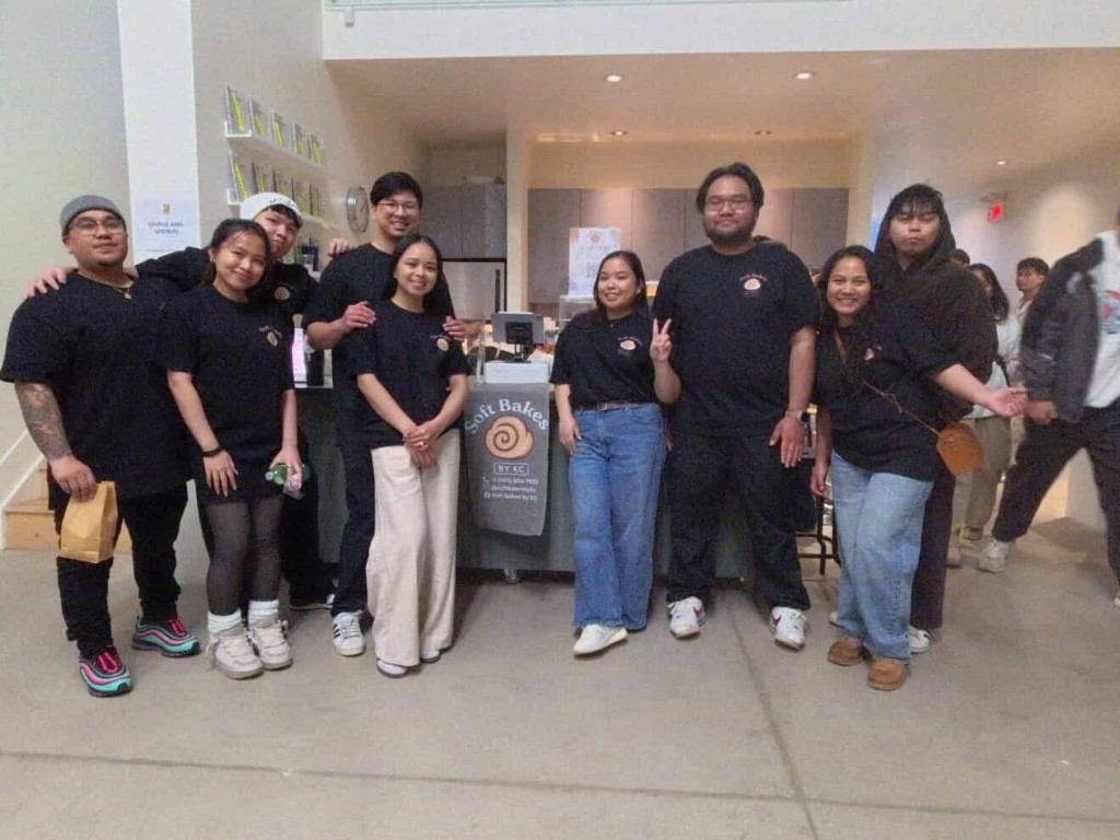 Soft Bakes by KC team and guests at SOHO Volume 1 event in front of branded booth