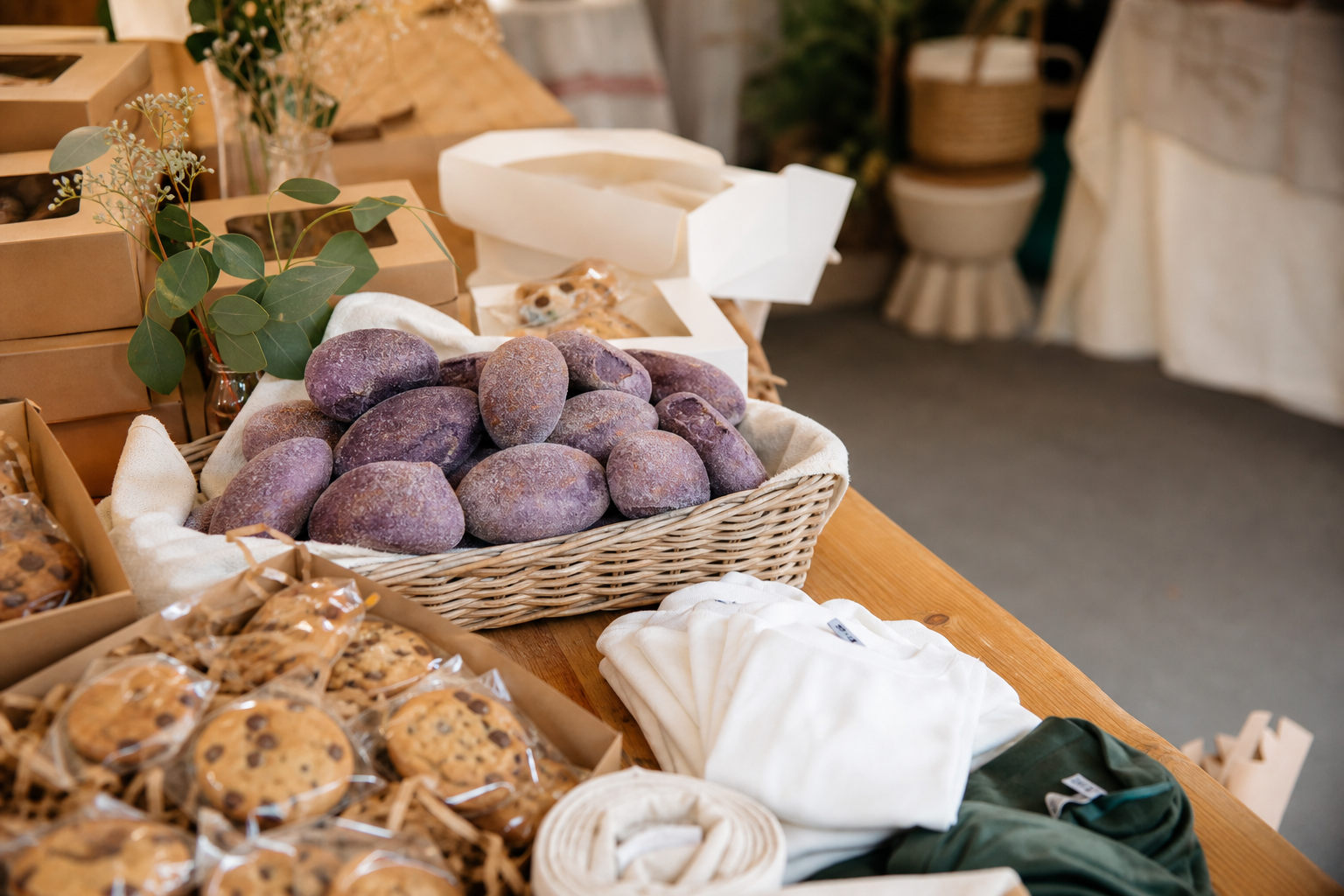 Soft Bakes by KC event table with cookie boxes and branded team apparel printed by Formulated Prints