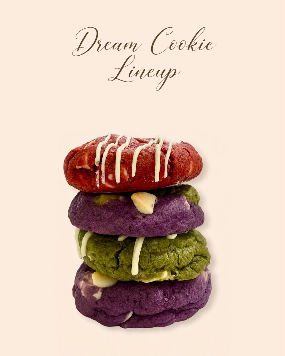 Stack of the Soft Bakes by KC Dream Cookie lineup: red velvet, ube, matcha, and ube cookies with white chocolate